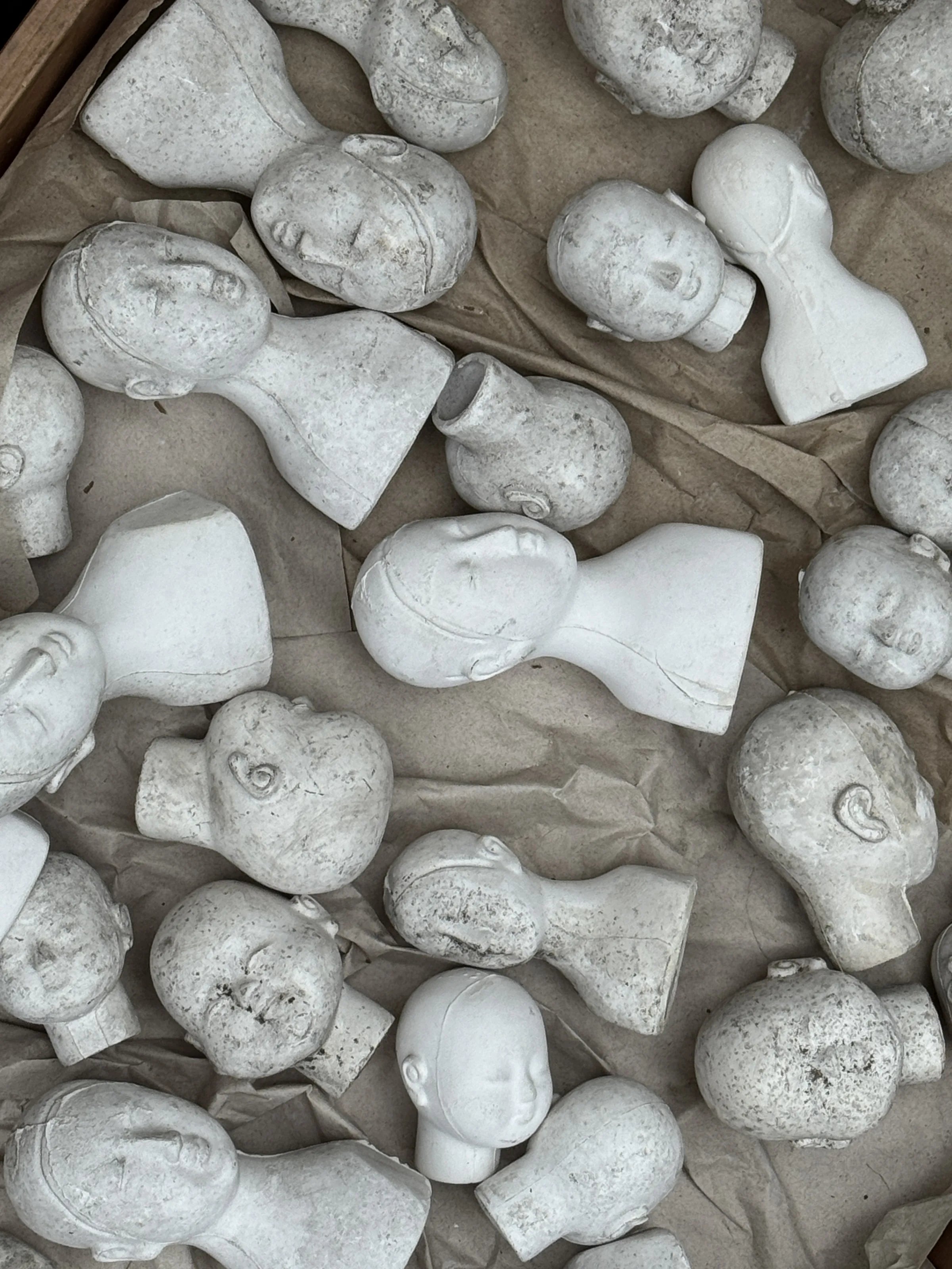 Plaster doll heads